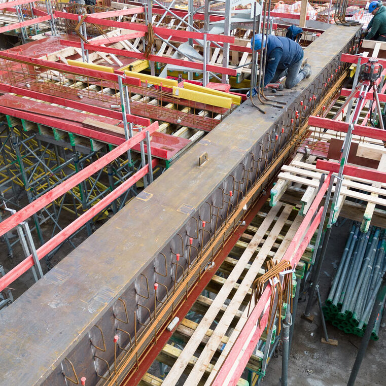 workers on the construction of the luxia building